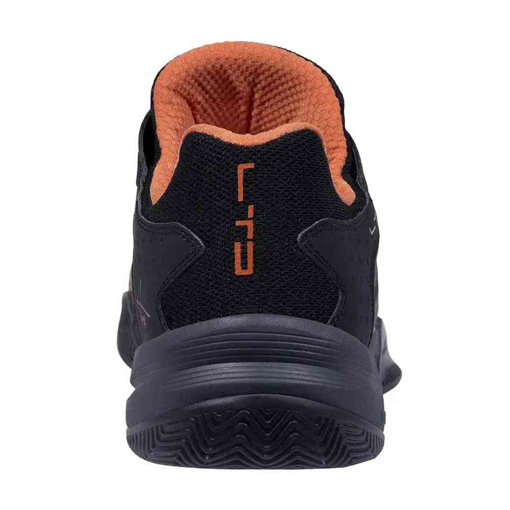 Rear view of Nox AT10 Lux Limited Edition athletic shoe, featuring padded orange collar and LTD logo on black heel.