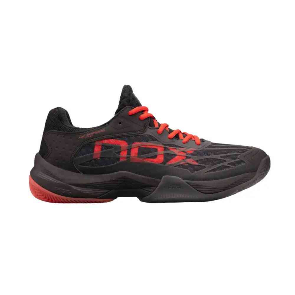 Nox AT10 Lux Black Black Red Calatluxnero athletic shoe with red laces and logo, designed for padel players seeking comfort and stability.