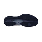 Outsole view of Nox Lux Nerbo White Navy Blue Caluxnerwhna showing herringbone tread for superior grip on padel courts.