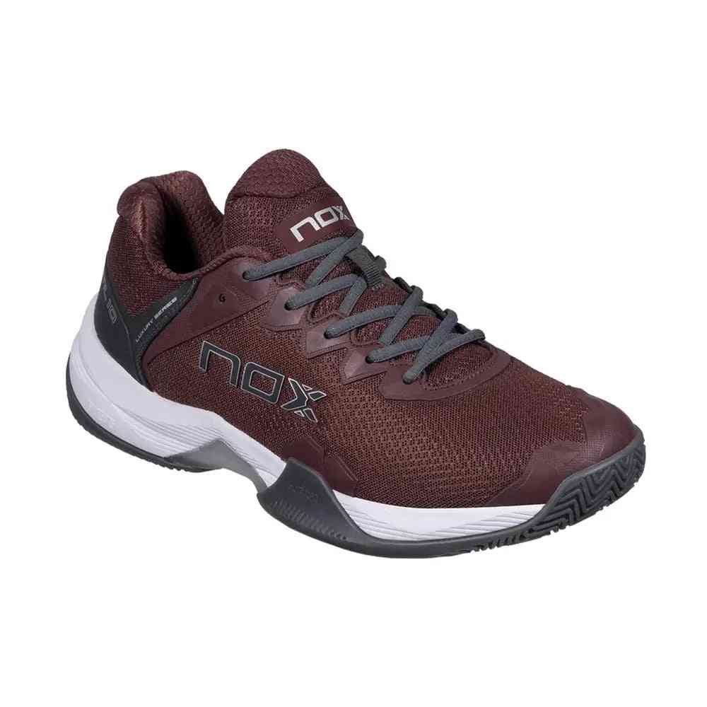Front angled view of Nox ML10 Hexa Calmlhexrurc maroon padel shoe showing breathable mesh upper and reinforced toe design.
