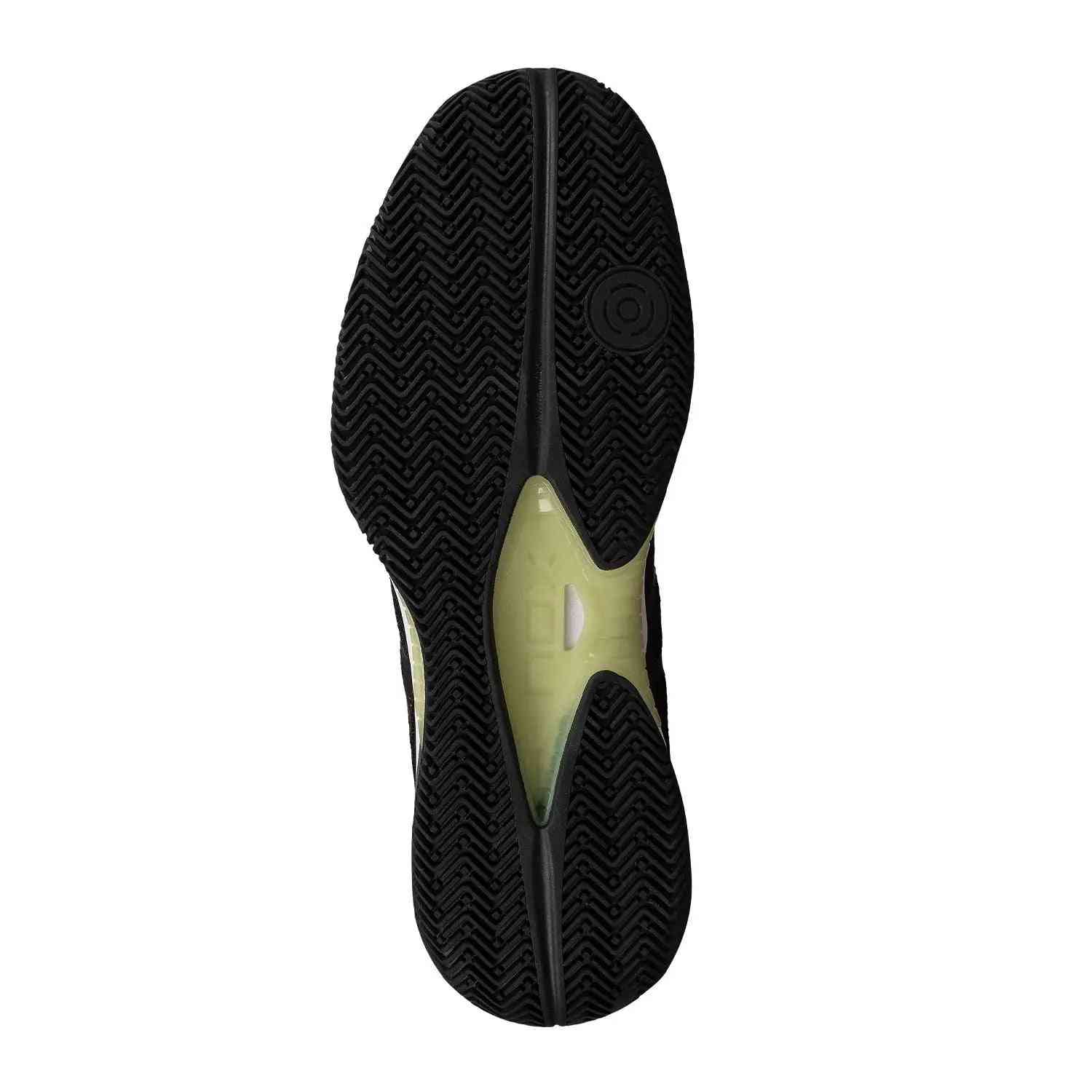 Outsole of Nox Nerbo Caluxnerblsl black shoe with herringbone tread pattern for optimal grip and performance on padel courts.