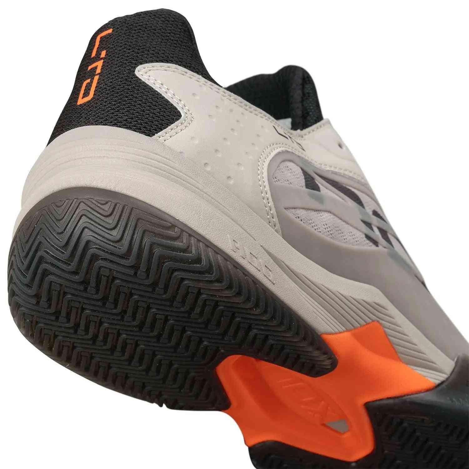 Close-up of heel and sole of Nox AT10 Limited Edition Calat10ltdd Beige highlighting shock-absorbing midsole and reinforced heel support.