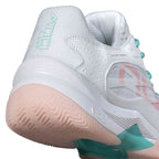 Close-up of Nox AT10 Lux Calatluxwhpo White Women's heel showing AT10 Lux branding, padded collar, and durable sole for stability and impact absorption.