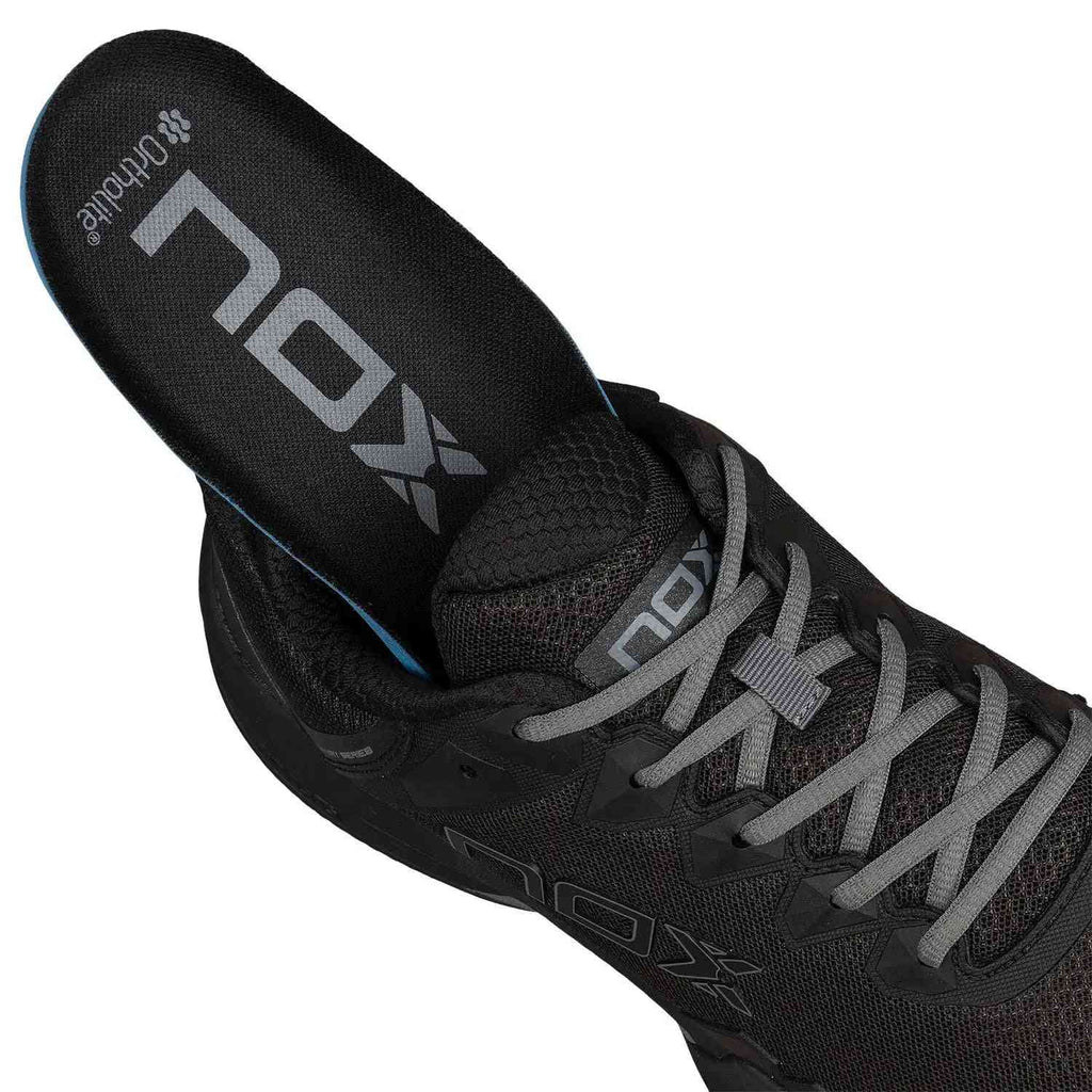 Close-up of Nox ML10 Hexa Calmlhexblgs Black shoe with Ortholite insole partially removed, showcasing premium comfort and support technology.