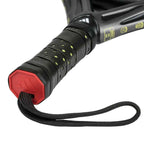 Detailed view of Adidas Adipower 10 Anniversary handle with ergonomic grip and wrist strap for secure play. Designed for comfort and control in padel matches.