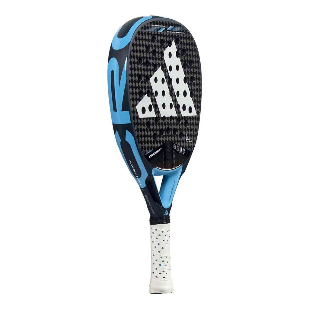 Side view of Adidas Cross It Carbon Blue by Maxi Arce padel racket showing aerodynamic frame and bold carbon fiber finish.