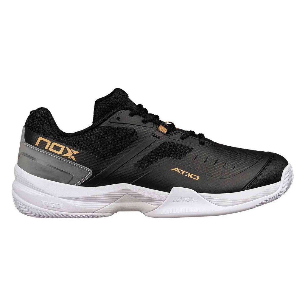 Nox AT10 Pro Calat10blgo Oro athletic shoe in black with gold accents, designed for padel performance and stability. Available at Ace Padel Store.
