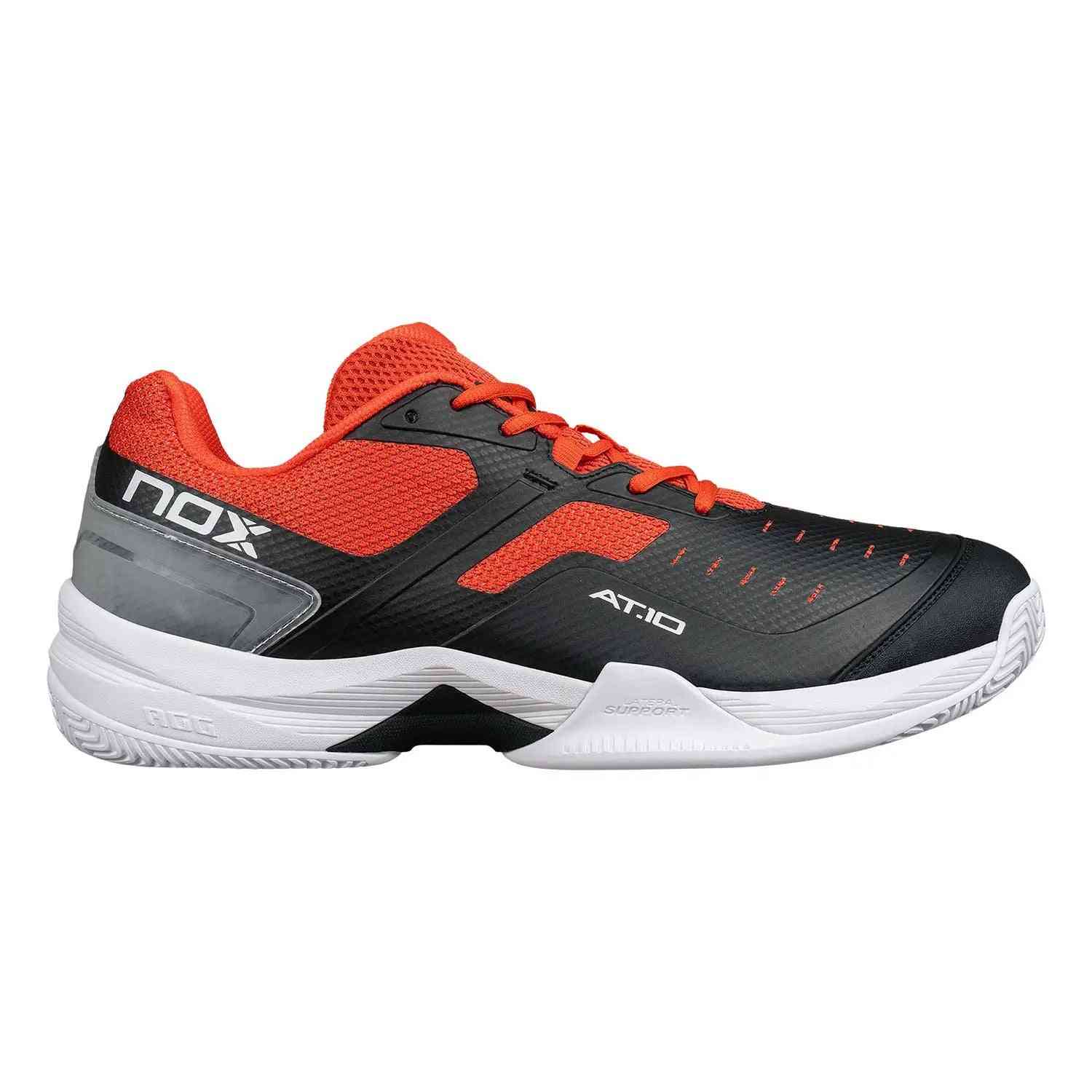 Nox AT10 Pro Calat10blre Black athletic shoe with red mesh upper, black side panels, and white sole for padel performance. Available at Ace Padel Store.